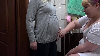 Play A nurse makes for a pregnant milf milky enema in hairy pussy and massages her vagina. Procedures unexpectedly end in orgasm. Fetish lesbians.